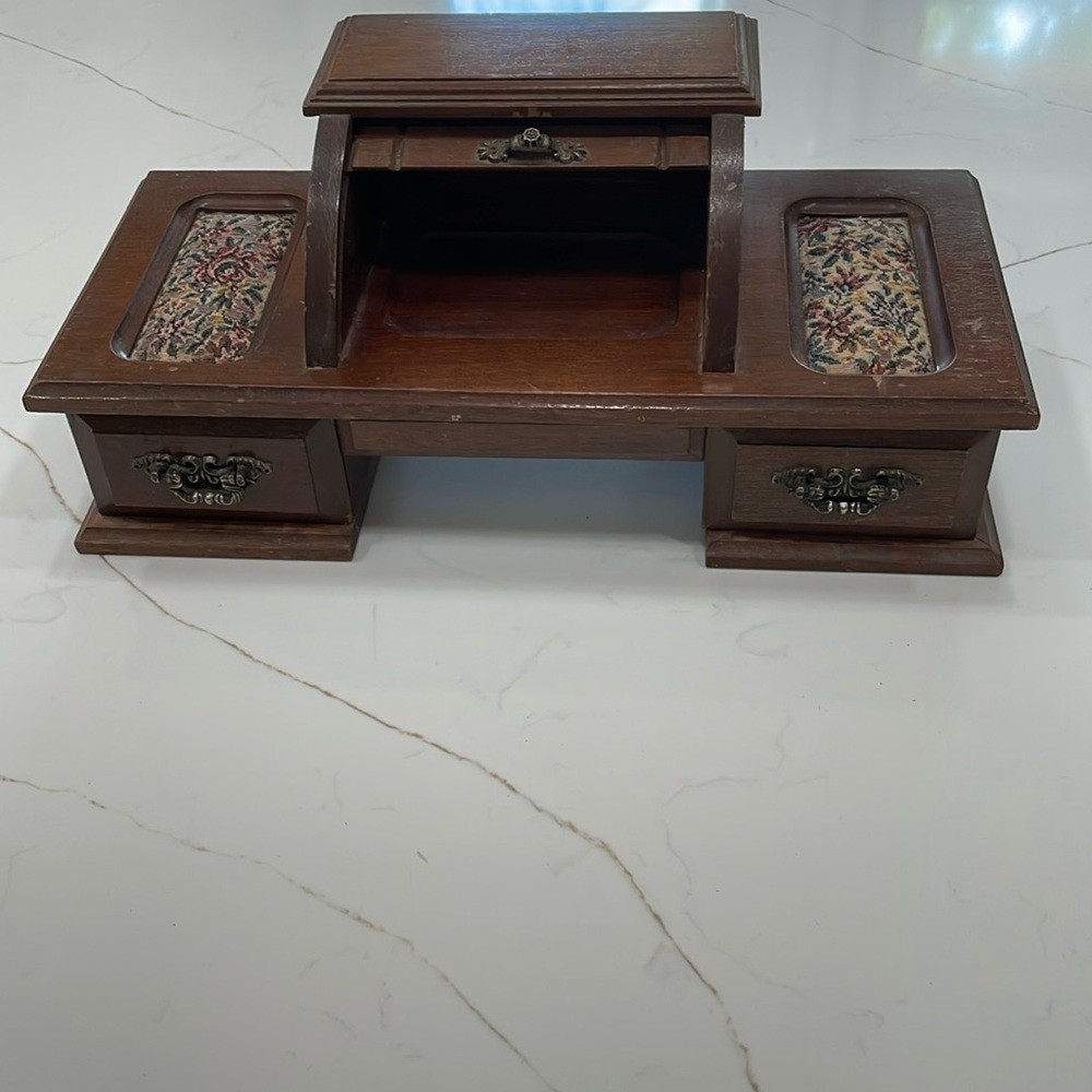 Vintage wood roll top jewelry box.